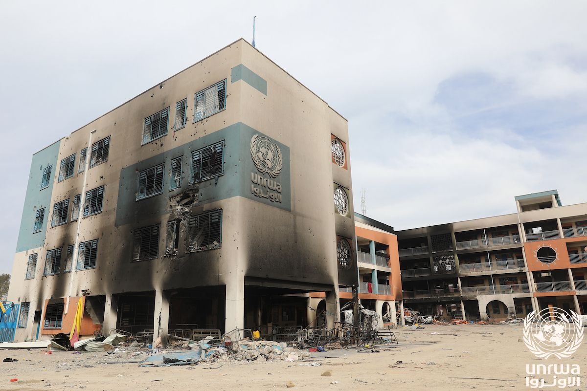 The burnt-out shell of the UNRWA Remal Co-ed School in the Gaza Strip, its classrooms gutted and blackened, February 2024.